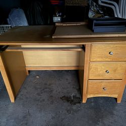 Solid wood desk with sliding out table