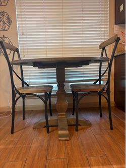 Pier 1 wooden dining room table & 2 chairs