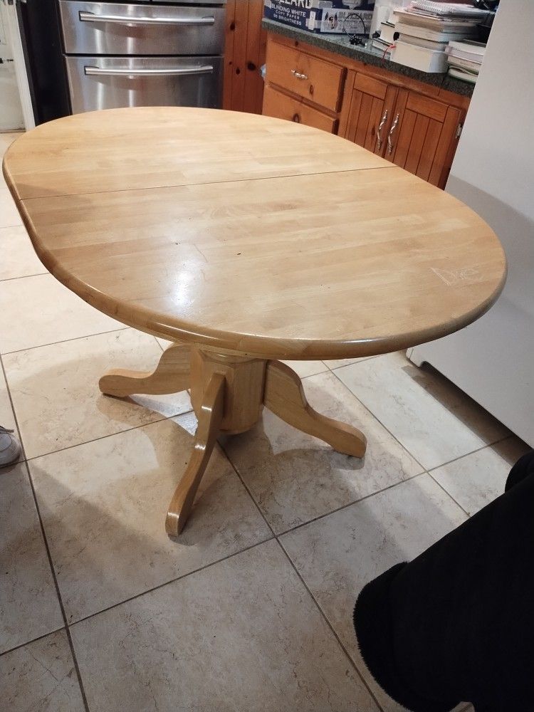 Kitchen Table W/Self Stored Leaf