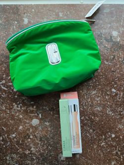 Clinque eye serum & cosmetic bag