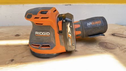 Rigid cordless 5 inch orbital sander with 2-ah battery included