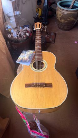 Vintage collectible by the Kawai-Teisco company Woolworths made in Japan guitar