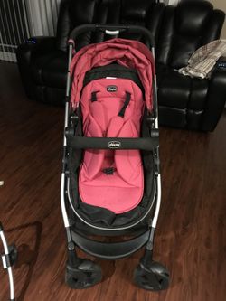 Carreola de bebe con vase y dos protectores azul y rosa