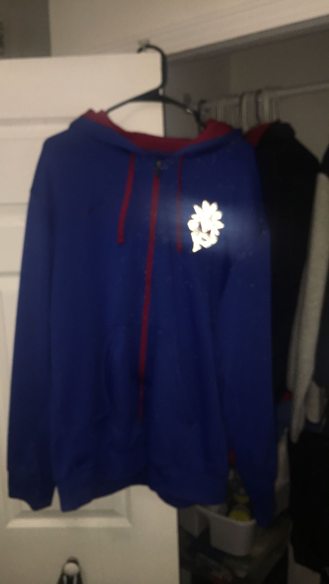 brand new… never wore… purchased 15 years ago, still as new as when i bought it. nike many packs hoodie with 3m reflective logo