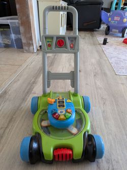 Lawn mower toddler toy popper