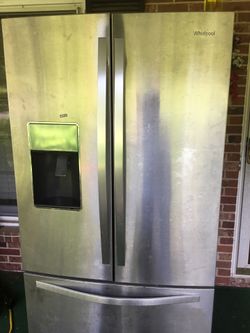 Whirlpool side by side with freezer on the bottom.