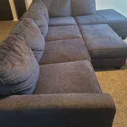 Blue Sectional With Ottoman 