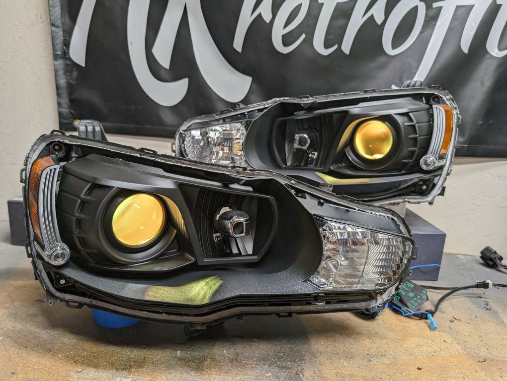 Brand New OEM Evo Headlights