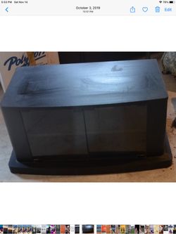 Tv stand with glass doors. Great condition.