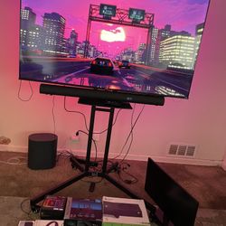 65 Inch 4K Hisense Tv With Rolling Tv Stand And Govee Backlight 