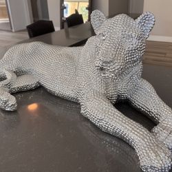 Crystal-Embellished Leopard Sculpture – $400 (Gallery Piece)  Make a bold statement with this stunning crystal-encrusted leopard sculpture. A true sho