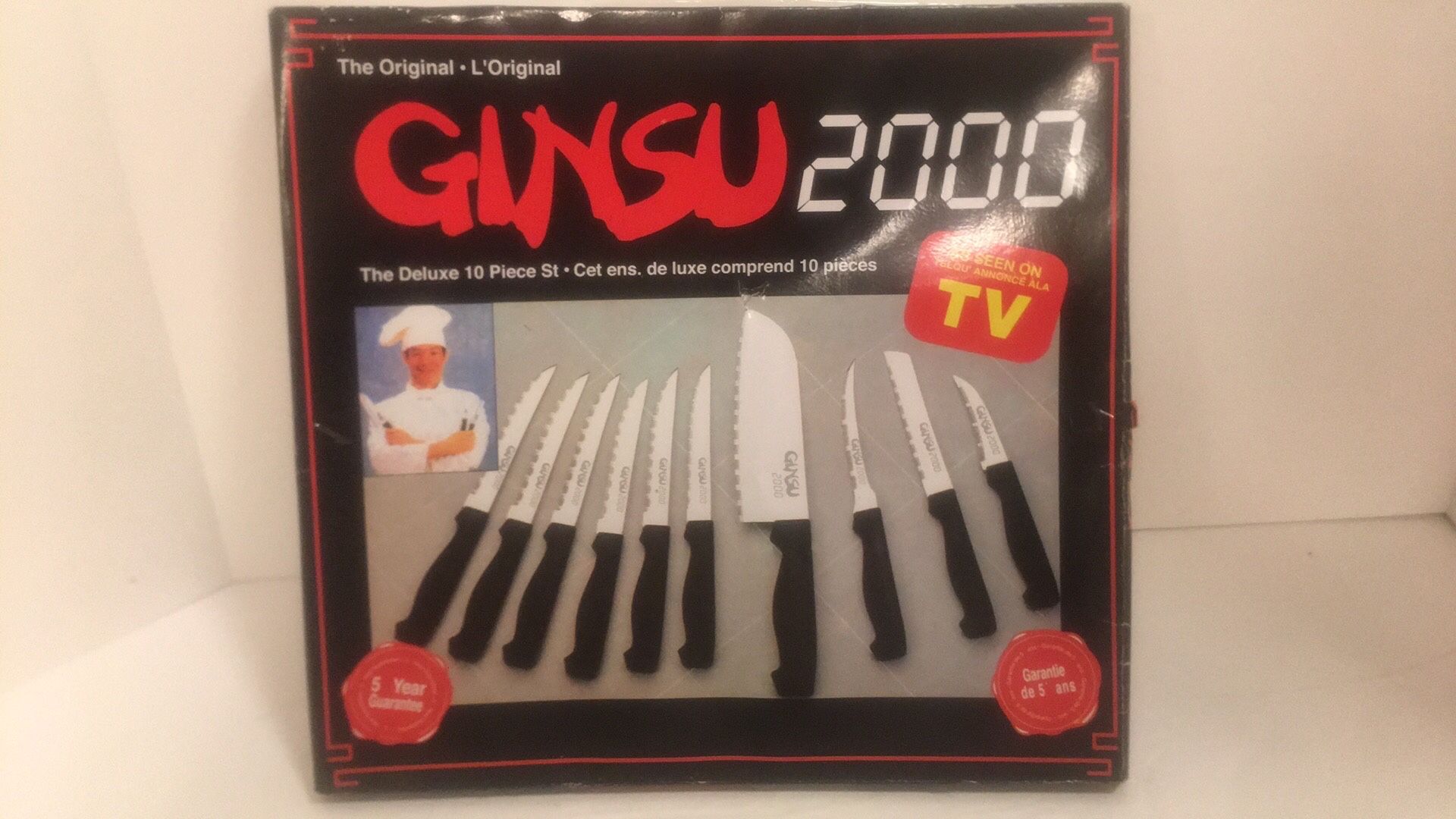 The Original Ginsu 2000 Deluxe 10 piece Knife set “As seen on TV” never need sharpening new never used in opened box. Note* have 2 sets