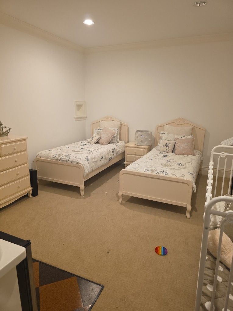 Twin Beds And Dresser And Side Table