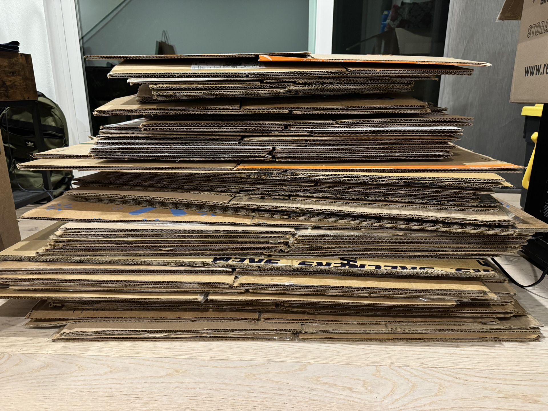 Moving Boxes w/ Packing Material 