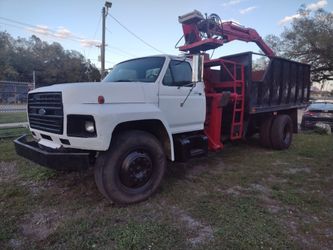 Grapple truck body dump And Bucket truck.. Tree Work Etc.