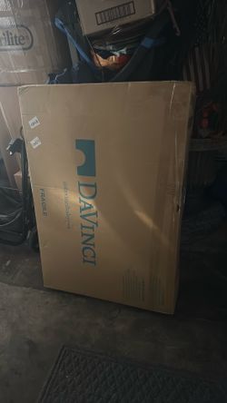 Crib Davinci it’s a light gray inside