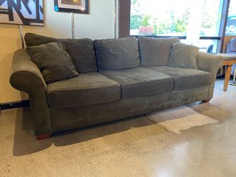Cozy Olive Green Three Seater Couch with Rolled Arms