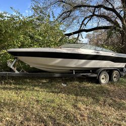 22” Boat And Trailer