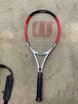 Tennis racket with cover