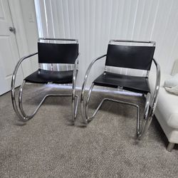 Modern Chair Designer /Stainless Steel and saddle Leather