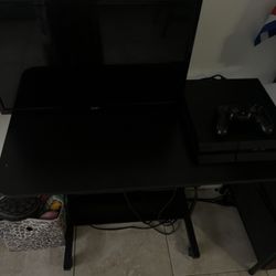 ps4 with tv and controller