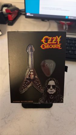 Ozzy Osbourne copper guitar and pick