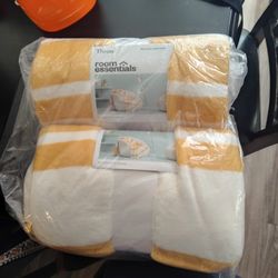 Two Yellow And White Throw Blankets
