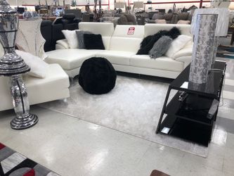 White sectional with adjustable headrest