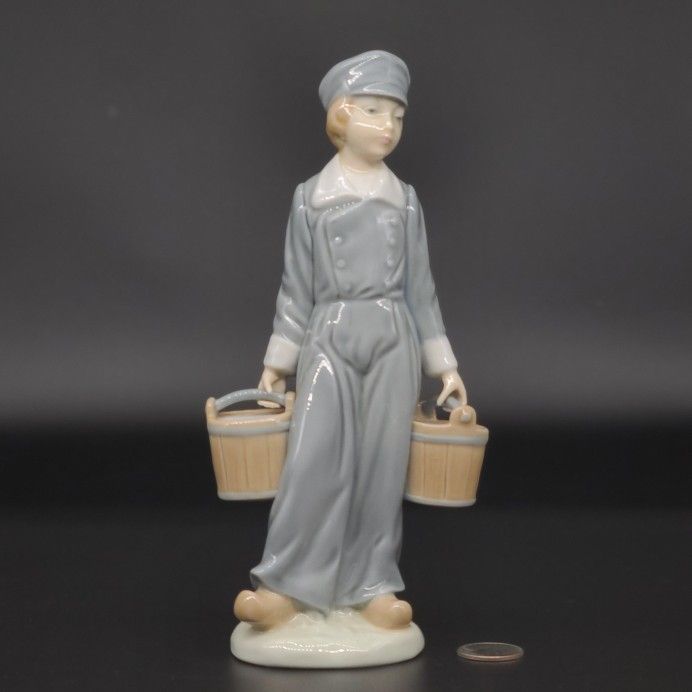 Lladro Figurine #4811 - Dutch Boy Holding Milk Pails