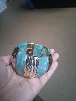 Green and gold designed bangle