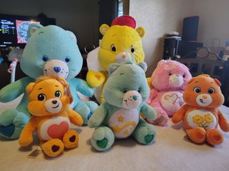 Used Care Bears Plushies.