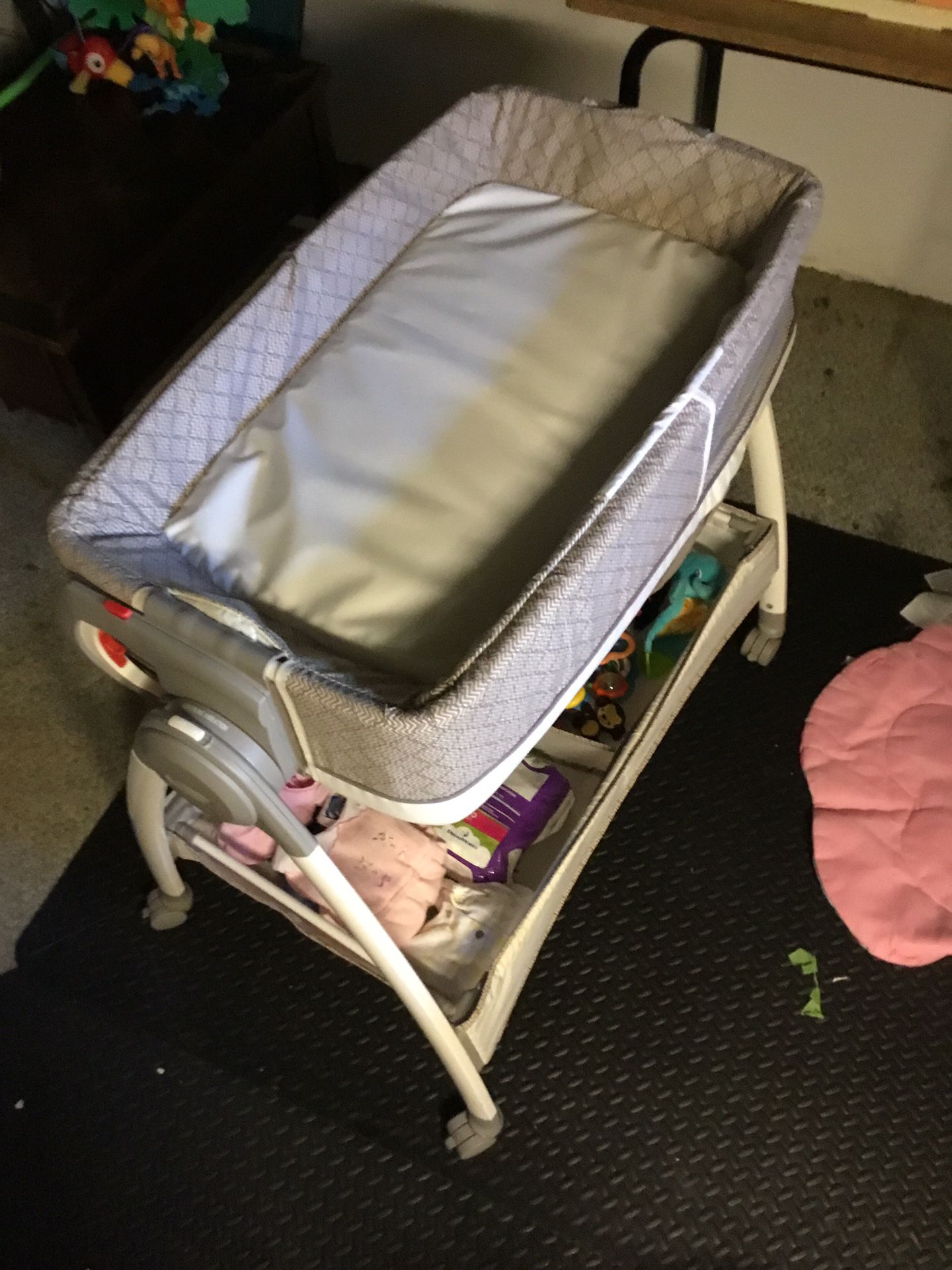 Grace Dream Sweet Bassinet and Changer. Soothing vibration. Turn upside down for newborn bed or changing bed. Bottom area for diapers and toys.