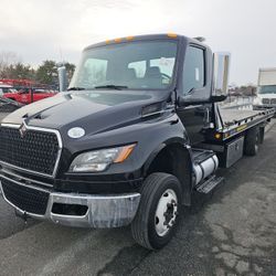 2023 INTERNATIONAL ROLL BACK MV607