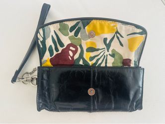 Glossy black leather clutch