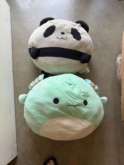 Plushes to give. Emoji, axolotl, manta ray, body-length cat, panda