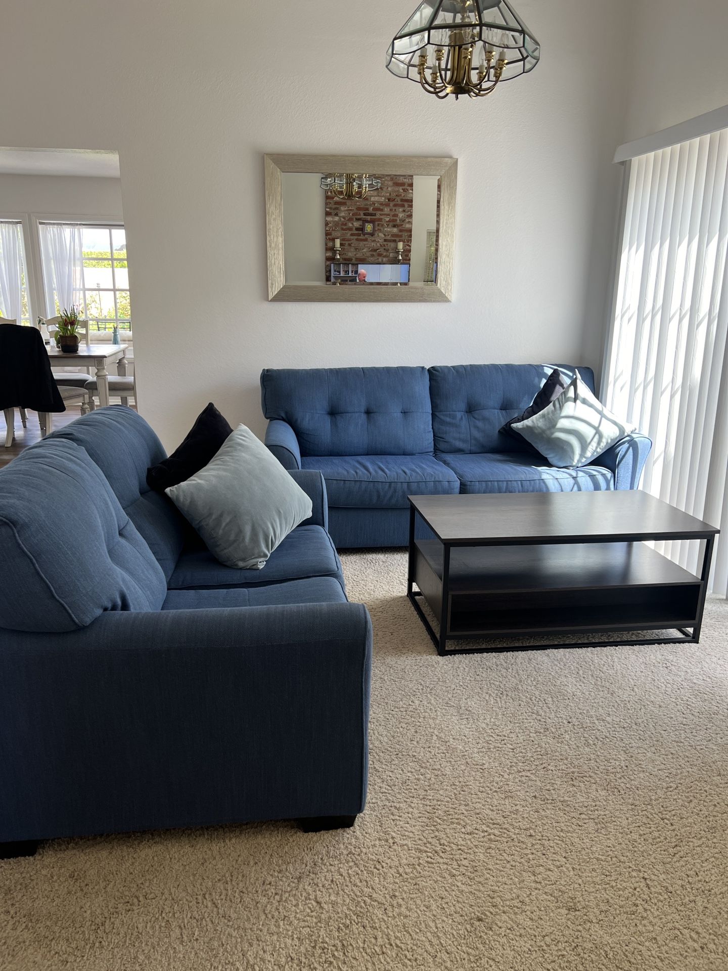 Two Blue Sofas With 4 Cushions