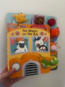 The wheels on the bus baby board book