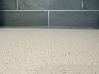 *Like NEW* 4” Quartz Backsplash