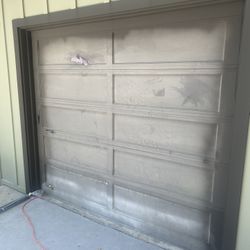 2 Used 8x7 Wood Garage Doors 