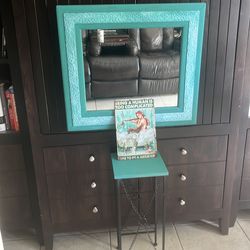 Bathroom decor- mirror, small table, & and mermaid picture