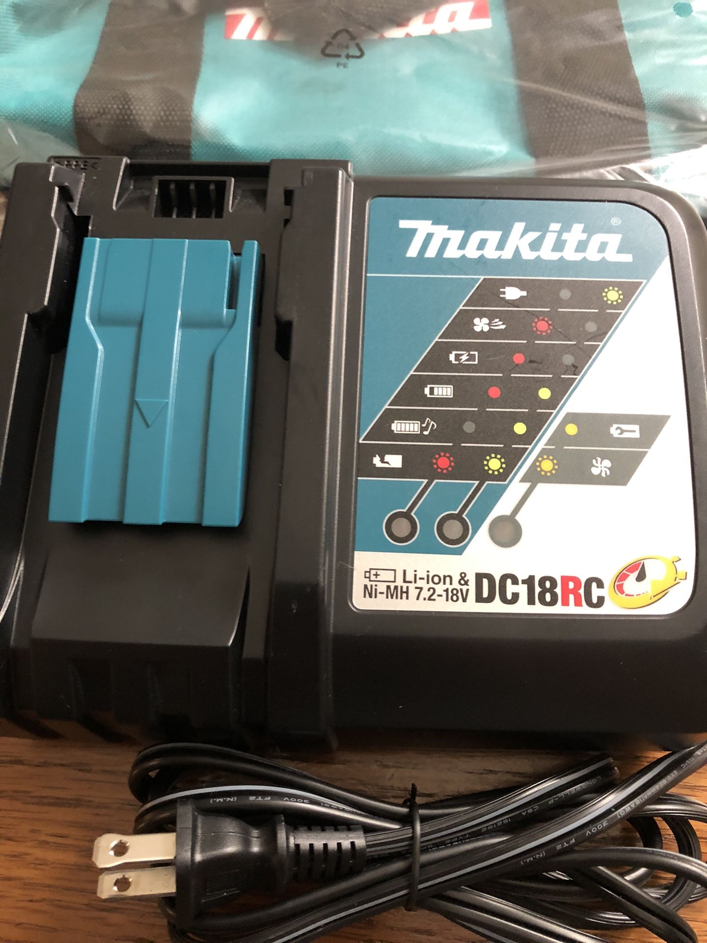 New Makita fast charger and new Makita bag.