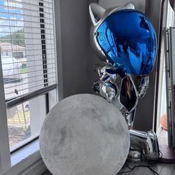 Cool Space Cat Leaning on Moon