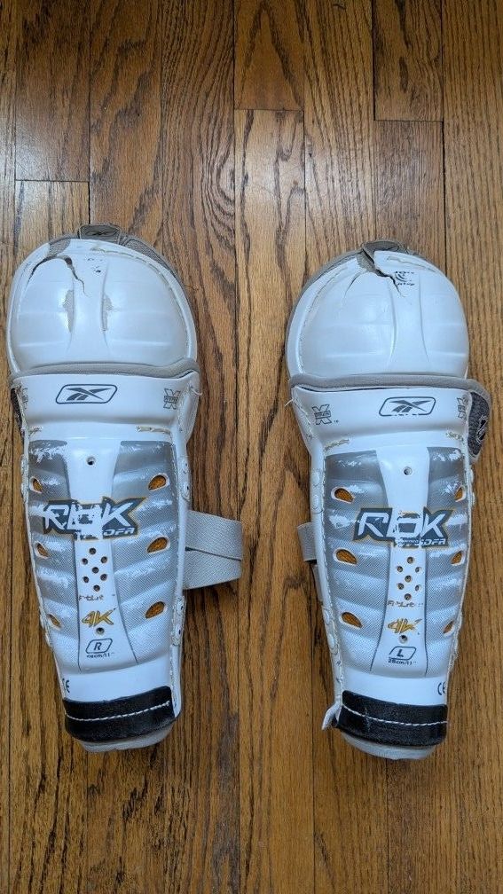 Reebok ice hockey shin guards - Size: 11inches/28cm