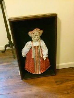 Large Russian doll in display case