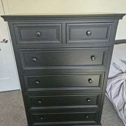 Large Black Dresser With 5 Levels 6 Drawers, and Wood Interior