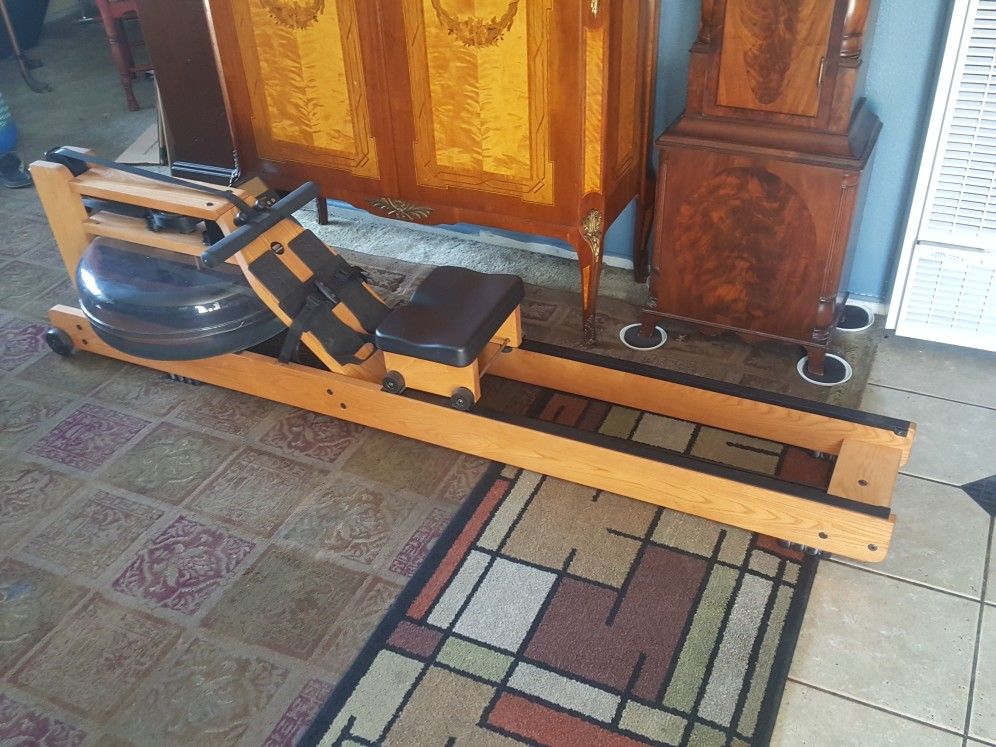 WATERROWER INC. OAK WOOD WATER ROWING MACHINE