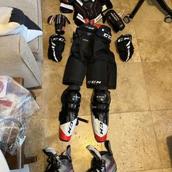 Youth S/M Bauer Hockey Gear Includes helmet  Bag And Skates