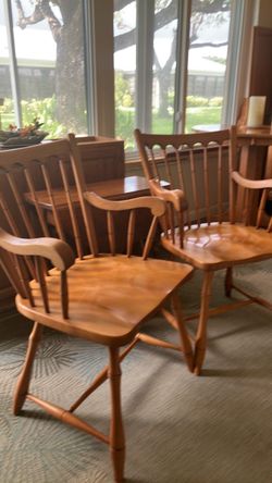 2 wood chairs with arms and ButterflyTable with extended arms. Can buy 2 matching chairs separately or with table. $50. for 3. Table $35. 2 chairs $15