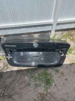 Nissan Maxima trunk lid parts