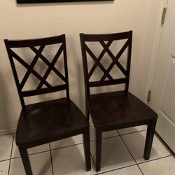 Two Wood Dining Chairs.. Delivery Is Available 